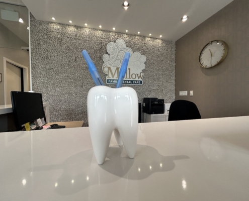 Adult and child patients receiving shared family dental care in Maple Ridge.