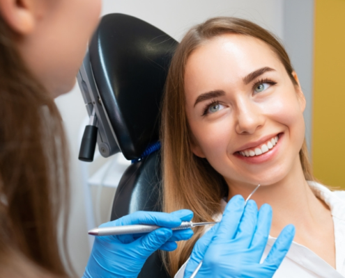 Dental hygienist performing a professional cleaning at Mellow Family Dental Care in Tri-Cities