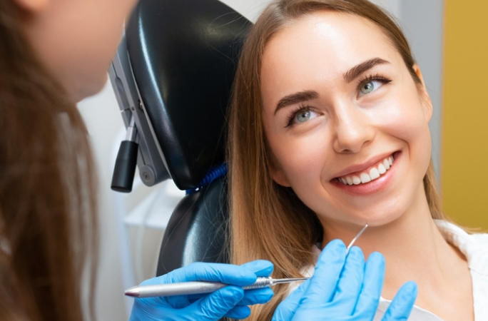 Dental hygienist performing a professional cleaning at Mellow Family Dental Care in Tri-Cities