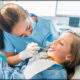 Gentle pediatric dentist near Pitt Meadows performing a comfortable checkup for a young child.