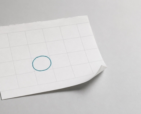 A torn calendar page with a single date circled in teal, representing the annual CDCP renewal deadline.